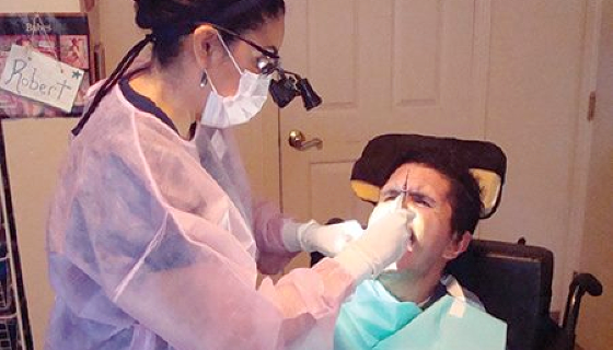 dentist attending patient